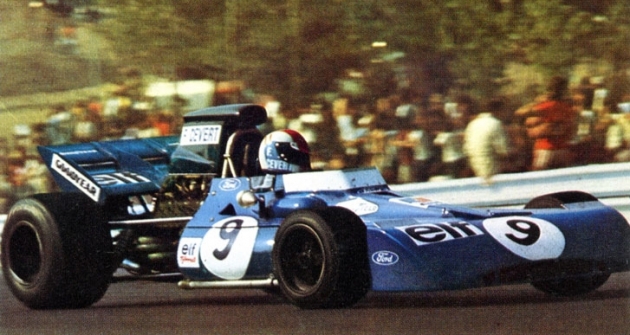 François Cevert (Tyrrell 002 Ford) na okruhu Watkins Glen jako vítěz Velké ceny USA 1971 (vpravo Ken Tyrrell)