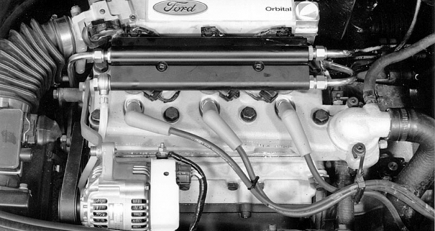 Zážehový dvoudobý tříválec Ford-Orbital 1.2 DI se nejen zkoušel ve Fiestě, ale také poháněl v devadesátých letech koncepční vozy Ghia/Ford Zážehový dvoudobý tříválec Ford-Orbital 1.2 DI se nejen zkoušel ve Fiestě, ale také poháněl v devadesátých letech koncepční vozy Ghia/Ford