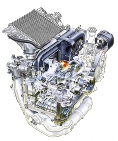 Přeplňovaný čtyřválec 2,5 l EJ Turbo ze druhé generace motorů Subaru, uvedené v roce 1989