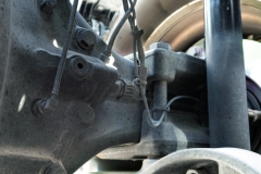 Pneumaticky ovládaný ventil „korýtka“ v rozvodovce zadní nápravy.