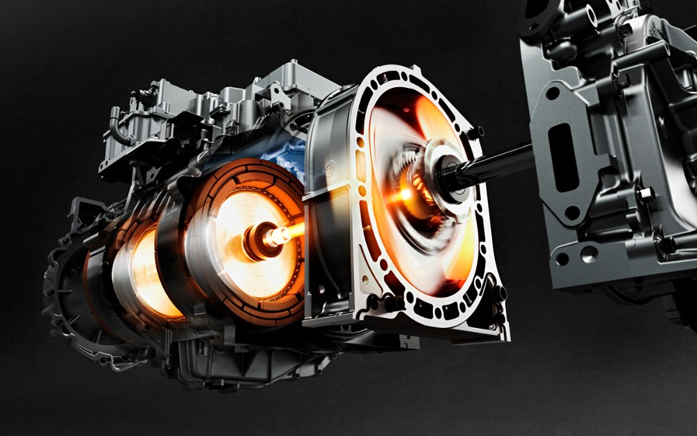 Poháněcí soustavu tvoří rotační motor pevně spojený s generátorem a samostatně, avšak na stejné ose umístěný trakční synchronní elektromotor